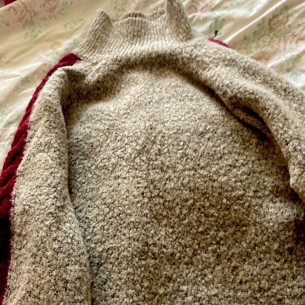 A nice cozy burgundy and grey sweater